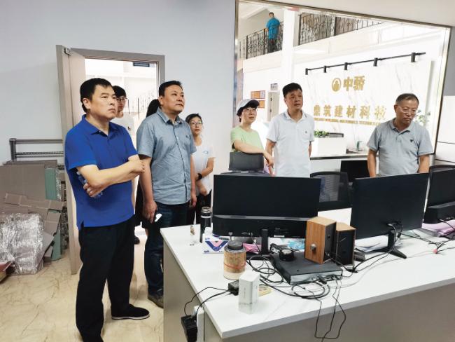 浙江金华市墙散中心开展预拌砂浆企业清洁生产达标验收